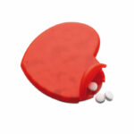 Miętówki w plastikowym dozowniku w kształcie serca. Pojemność: 12 g.. Gadżet reklamowy dla firmy.